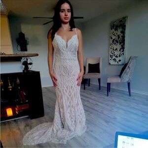 Heavily Beaded Mermaid Wedding Dress with Spaghetti Straps and Plunging Neckline